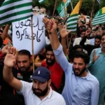 6a27fba56a9b4-clashes-broke-out-after-tensions-flared-over-the-death-of-a-trader--who-was-allegedly-shot-during-a-094015934-16x9